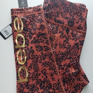 Bebe Sports Mocha Animal print Capri leggings pock